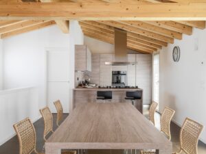 Interiors of a Modern Dining Room and the Kitchen